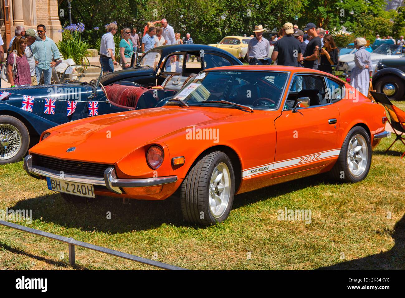 BADEN BADEN, GERMANY - JULY 2022: orange 1972 Datsun 240Z, oldtimer meeting in Kurpark. Stock Photo