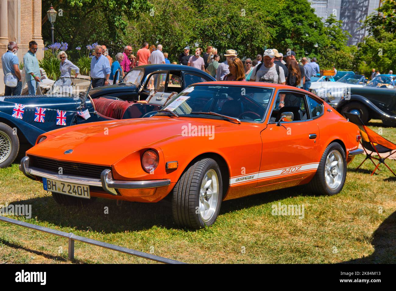 BADEN BADEN, GERMANY - JULY 2022: orange 1972 Datsun 240Z, oldtimer meeting in Kurpark. Stock Photo