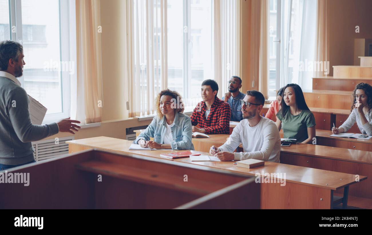 Woman man talking laughing classroom hi-res stock photography and ...