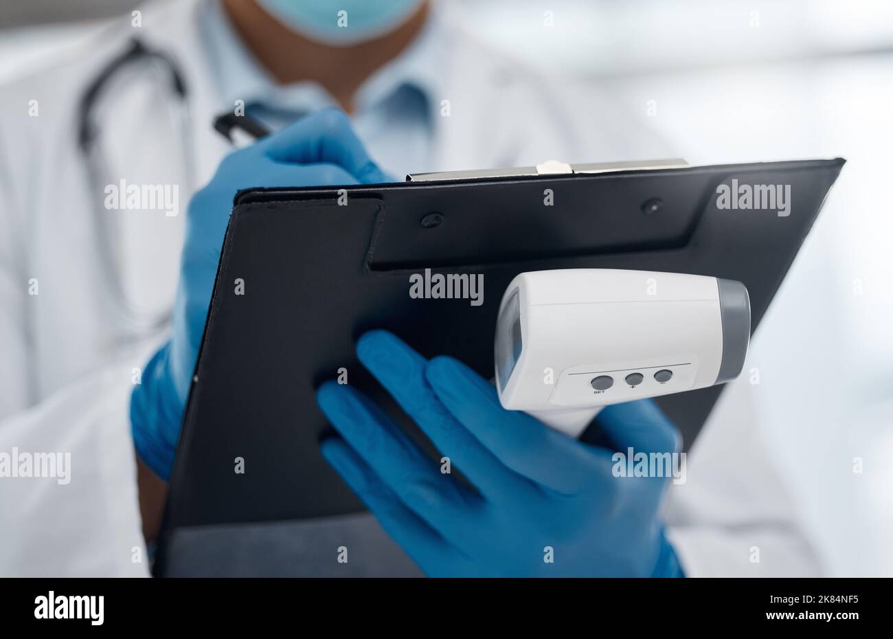 Always make sure you dont have a fever. an unrecognizable doctor