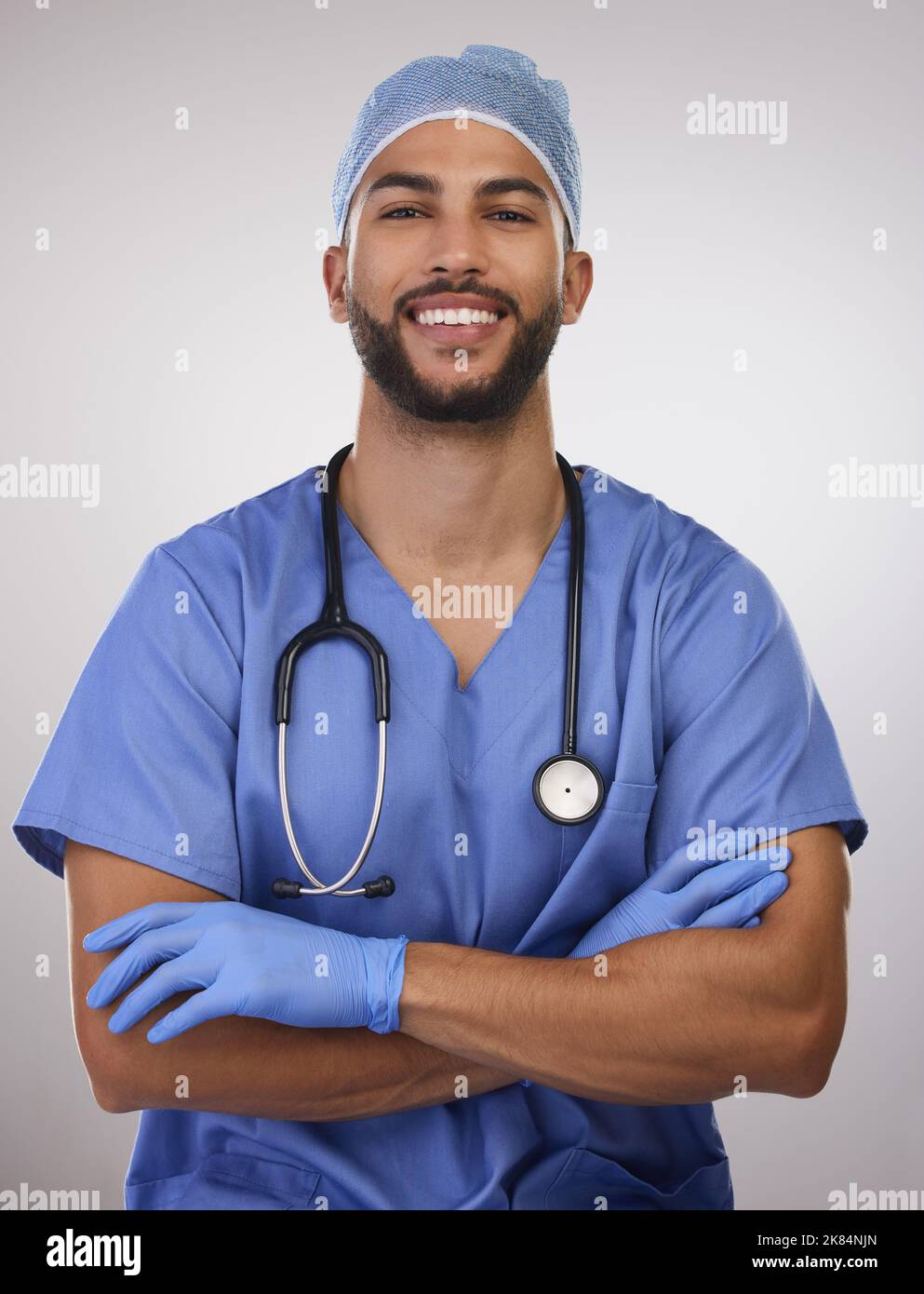 I couldnt be happier in my career a handsome young nurse standing