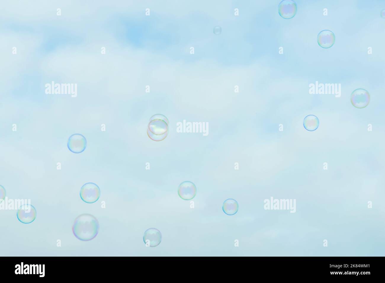 Beautiful soap bubbles on sky background Stock Photo - Alamy