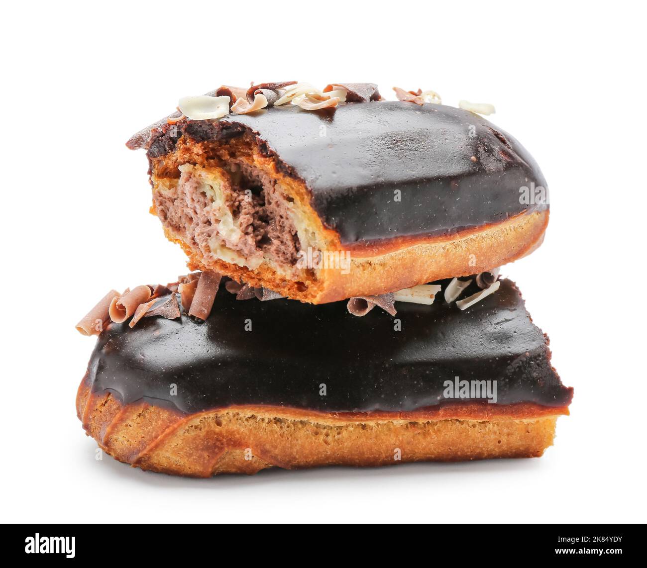 Smashed Eclair Broken chocolate eclair on white background Stock Photo - Alamy