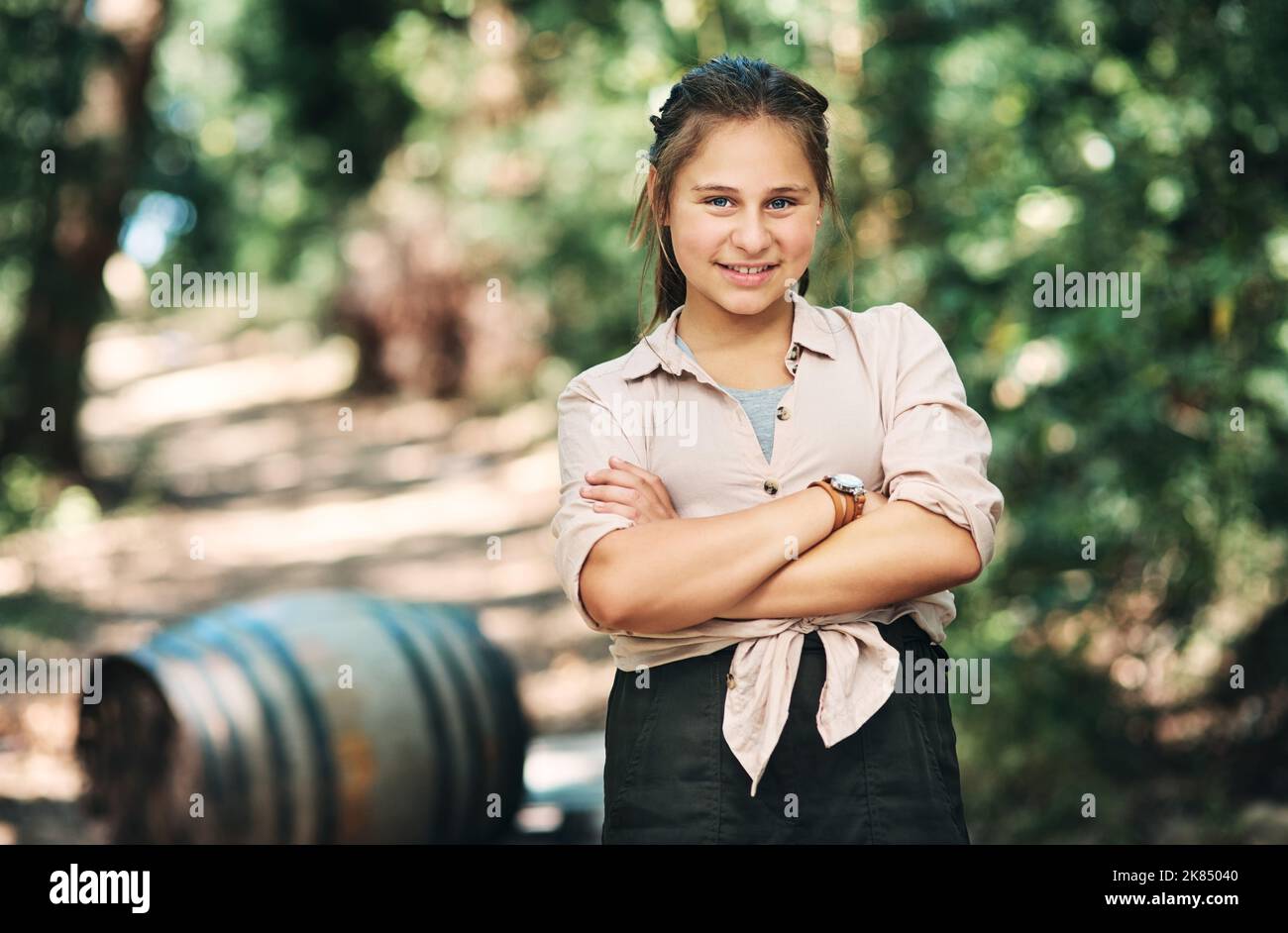 Id rather be in nature. Portrait of a confident teenage girl having fun at summer camp. Stock Photo