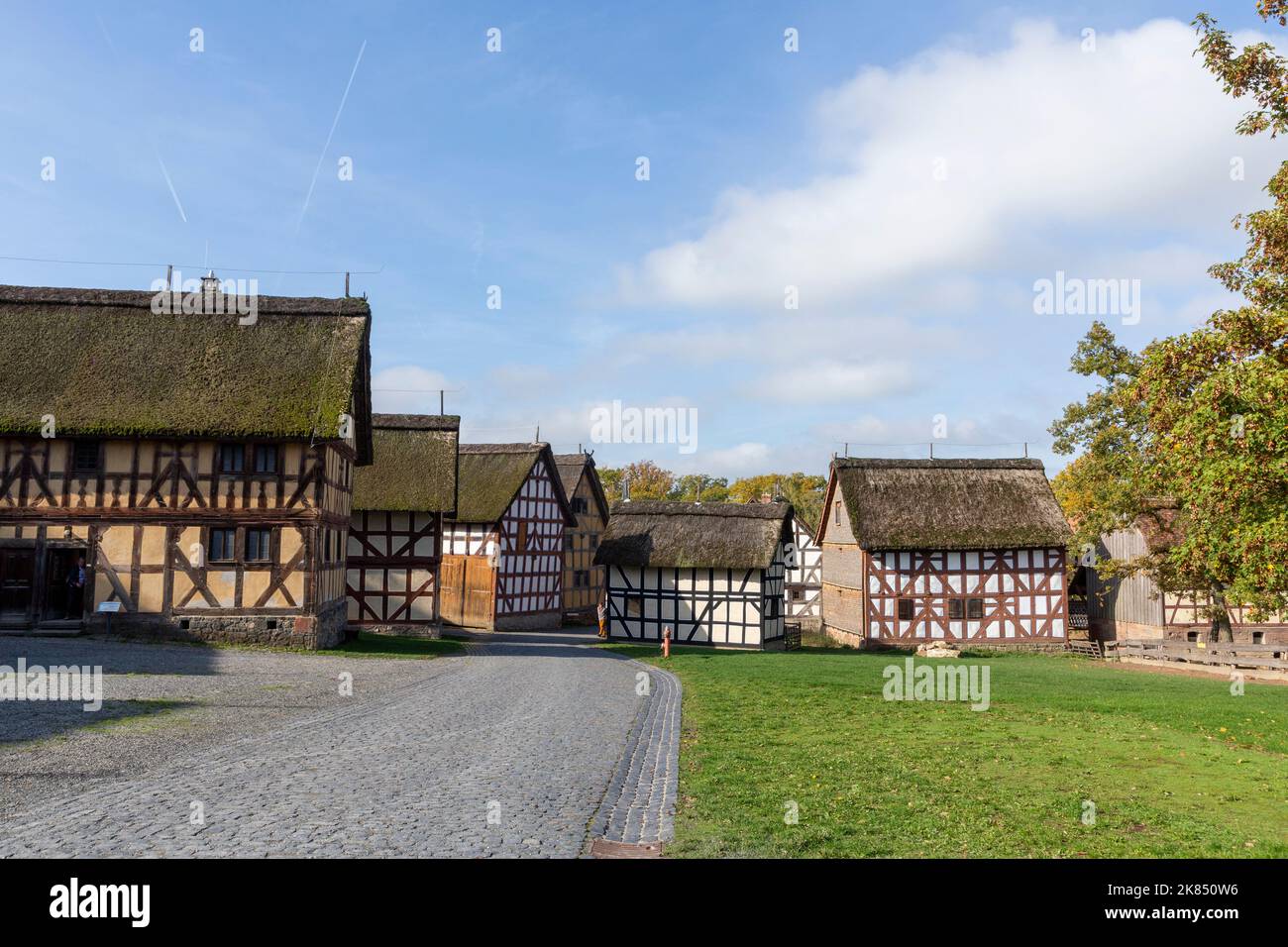 Neu Anspach, Germany - October 19, 2022: old historic half timbered farm houses at Hessenpark in Neu Anspach. Since 1974, more than 100 endangered bui Stock Photo