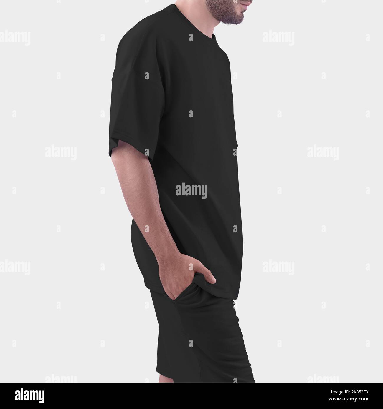Mockup of an black oversized men's t-shirt for design, print, pattern. Men's clothing template, fashion clothes isolated on background. Stock Photo