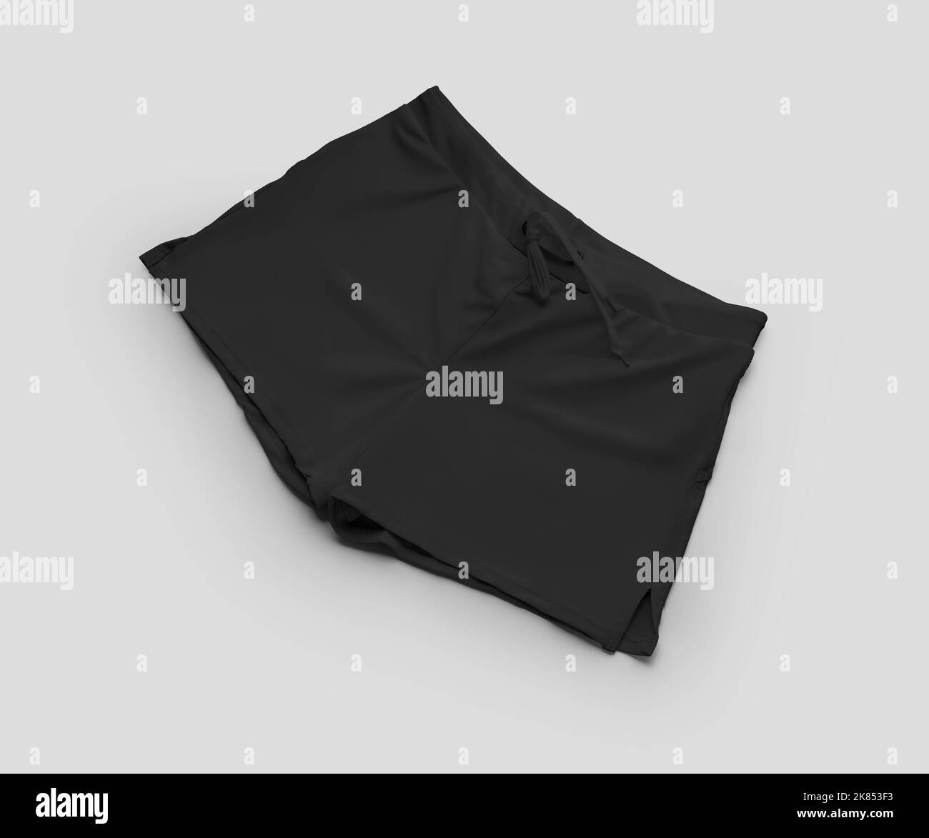 Mockup of black swimming trunks, subject with tag close-up, isolated on background. Template of fashionable boxers, summer clothes with ties at the wa Stock Photo