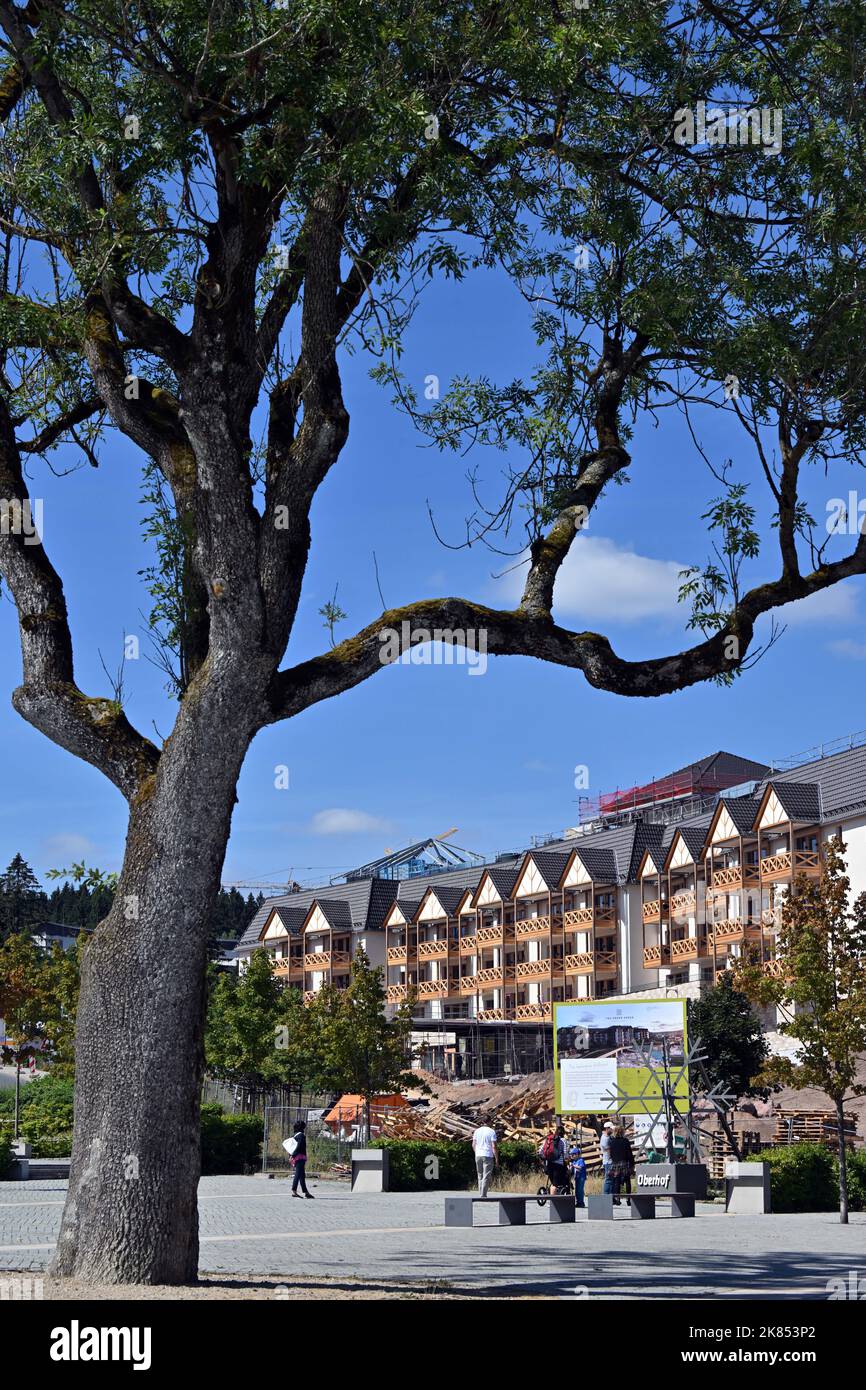 Oberhof, Germany. 28th July, 2022. A family hotel is being built in the town center. Construction of the five-star hotel was due to start at the end of 2019, and an Austrian entrepreneur had budgeted around 50 million euros for the new building. The house with 110 rooms and 15 chalets is to open this year. Credit: Martin Schutt/dpa/Alamy Live News Stock Photo