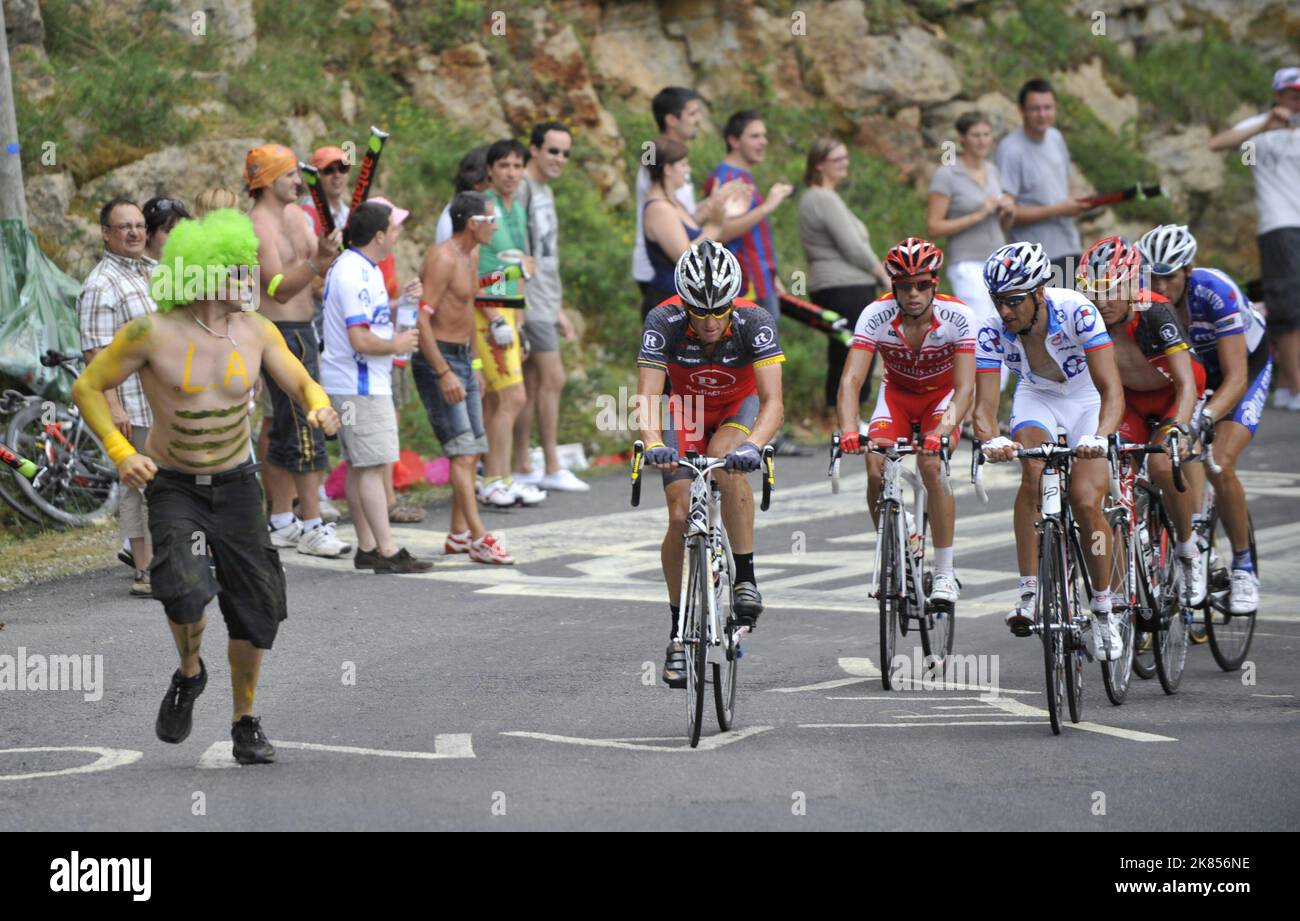 RadioShack's Lance Armstrong of the USA finishes the Tour de France