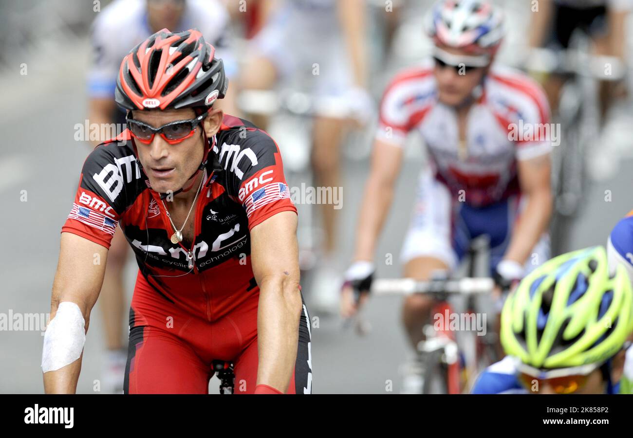 BMC Racing Team s George Hincapie Rides Over The Finish Line With An bmc-racing-team-s-george-hincapie-rides-over-the-finish-line-with-an