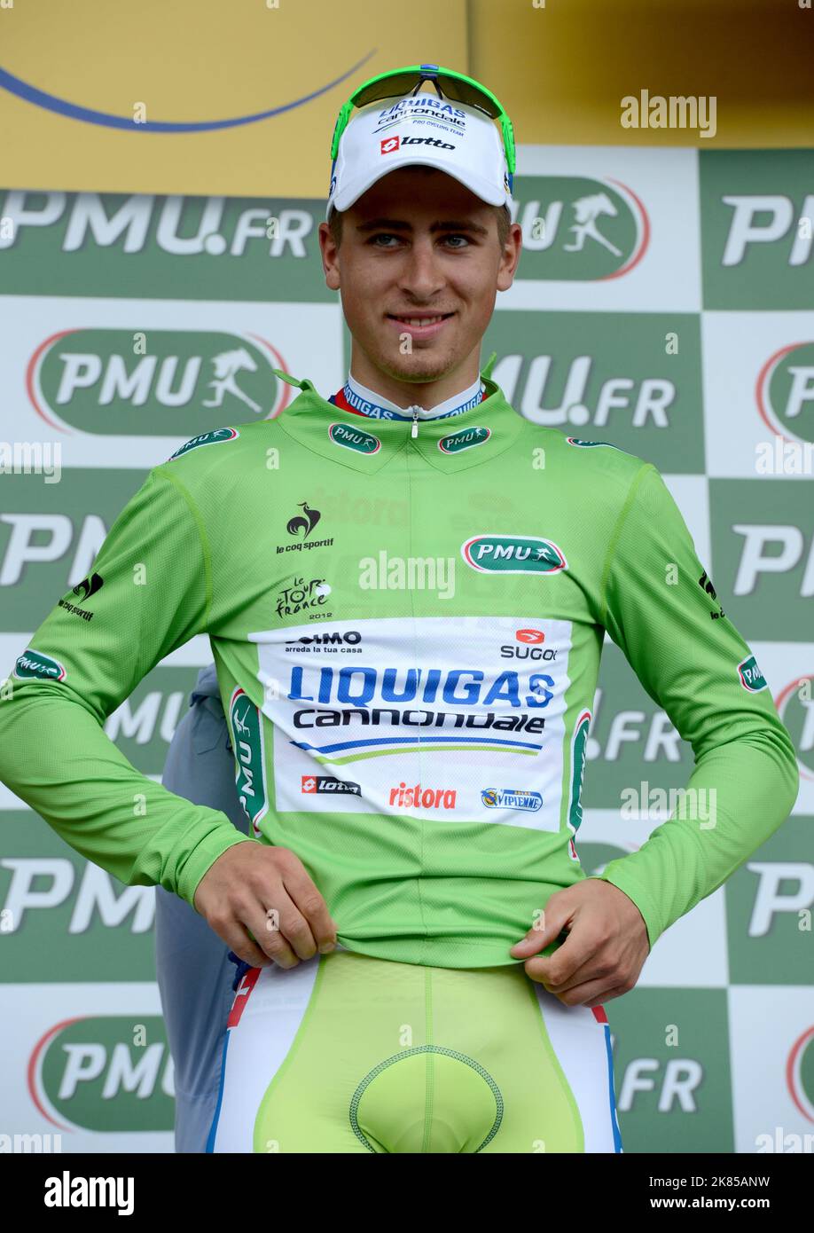 Peter Sagan takes the stage win ahead of Andre Greipel and Matthew Goss and Kenny Rober Van Hummel during Stage 6 of the 2012 Tour de France and stands on the podium to collect his trophy Stock Photo