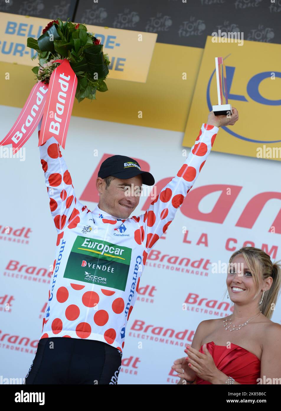 Thomas Voeckler team Europecar, collects his trophy on the podium after winning Stage 10 and taking the mountain leader's jersey, as well as the Brandt prize for the most competitive, Macon - Bellegarde - sur - Valserine. Stock Photo