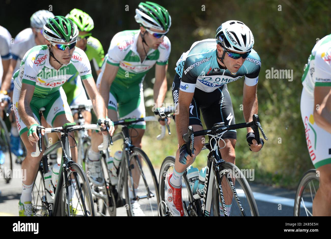 Omega Pharma Quickstep's Jerome Pineau rides amongst the peloton at the