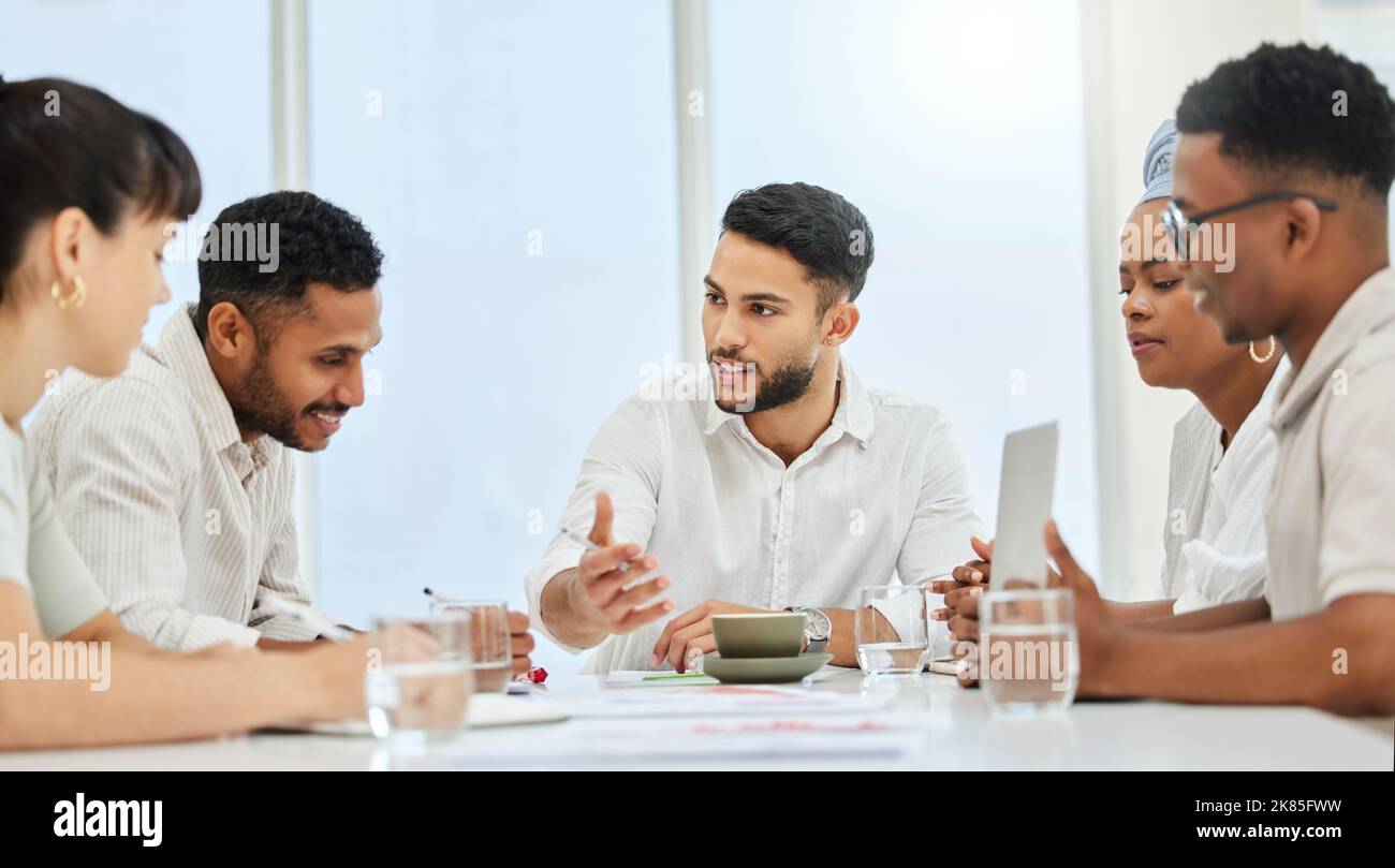 Theyre all on the same page. a group of young diverse businesspeople ...