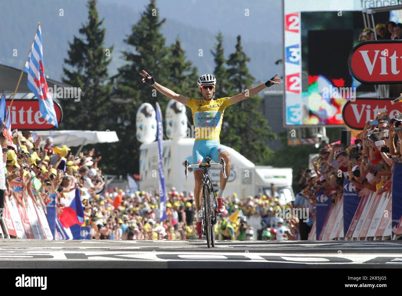 Yellow Win Vincenzo Nibali crosses the finish line to win the stage and retain his ...