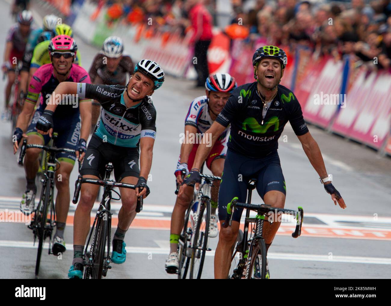 Liege Bastogne Liege  Alejandro Valverde (Movistar) celbrates first place at Liege Bastogne Liege while Julian Alaphilippe shows his frustration at coming second him twice in a row Stock Photo