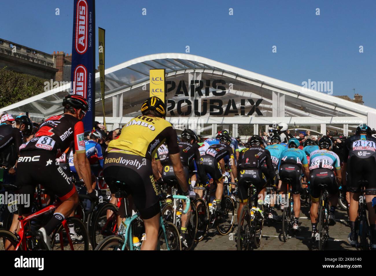 Greg Van Avermaet (left) starts the race Stock Photo Alamy