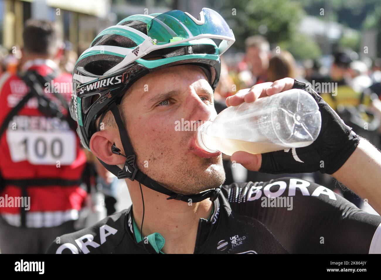 Rafal Majka bora poland takes a drink after hard stage where he lost