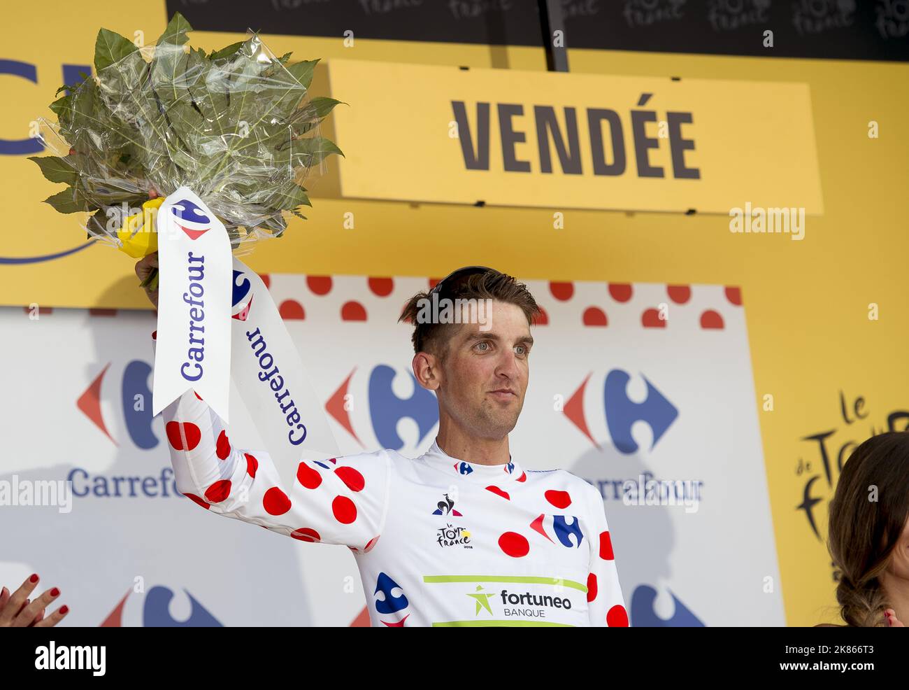Finish line Kevin Ledanois (Team Fortuneo-Samsic) takes the mountain leader's jersey on the first day of racing during Tour de France 2018 Stage 1 - Noirmoutier en L'Ille to Fontenay Le Comte.  Stock Photo