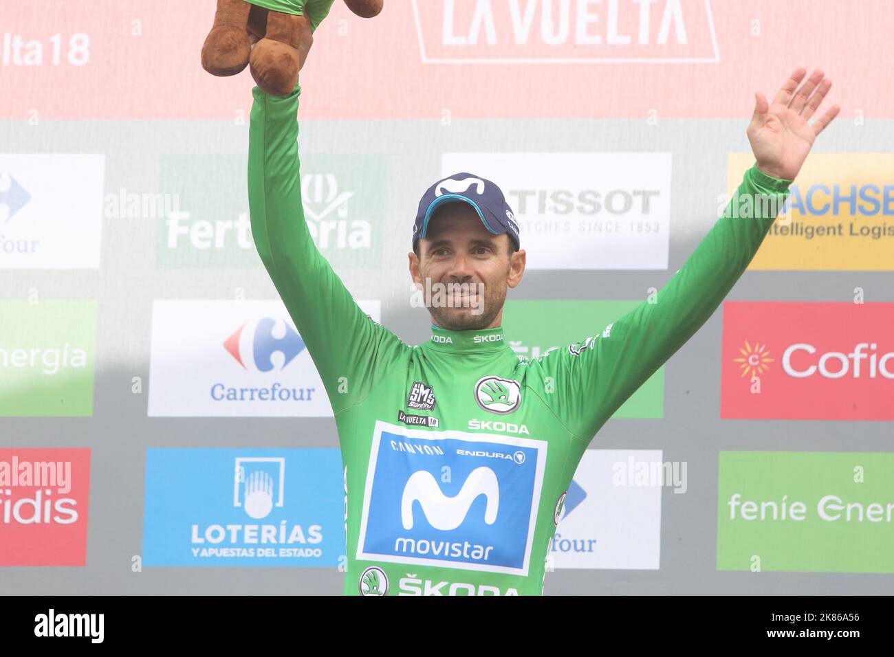Movistar's Alejandro Valverde celebrates with the green points jersey during Stage 19 of the Vuelta a Espana (Tour of Spain) from Escaldes-Engordany to Coll De La Gallina on September 15, 2018. Stock Photo