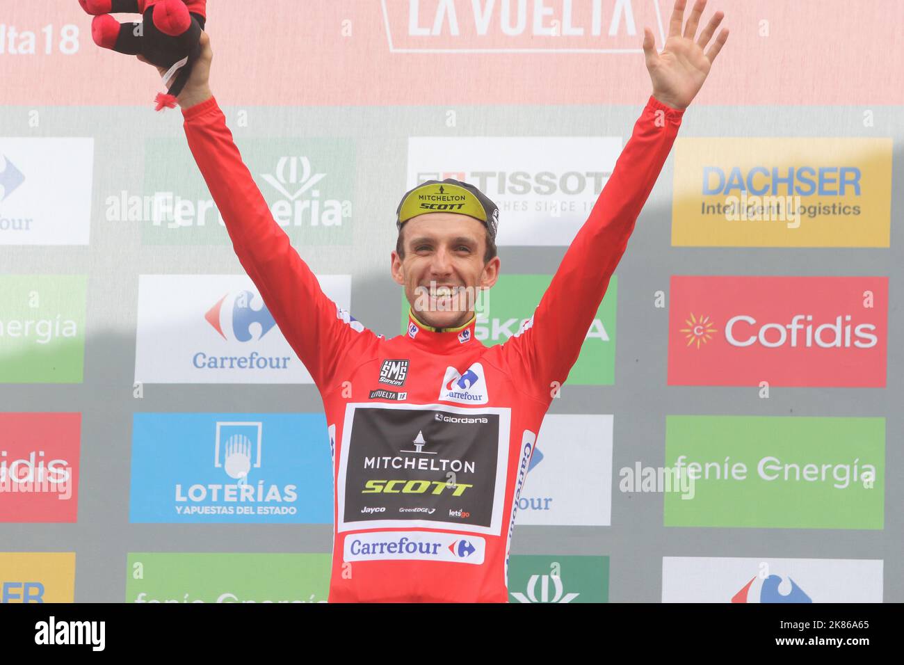 Mitchelton Scott's Simon Yates celebrates with the red jersey during Stage 19 of the Vuelta a Espana (Tour of Spain) from Escaldes-Engordany to Coll De La Gallina on September 15, 2018. Stock Photo