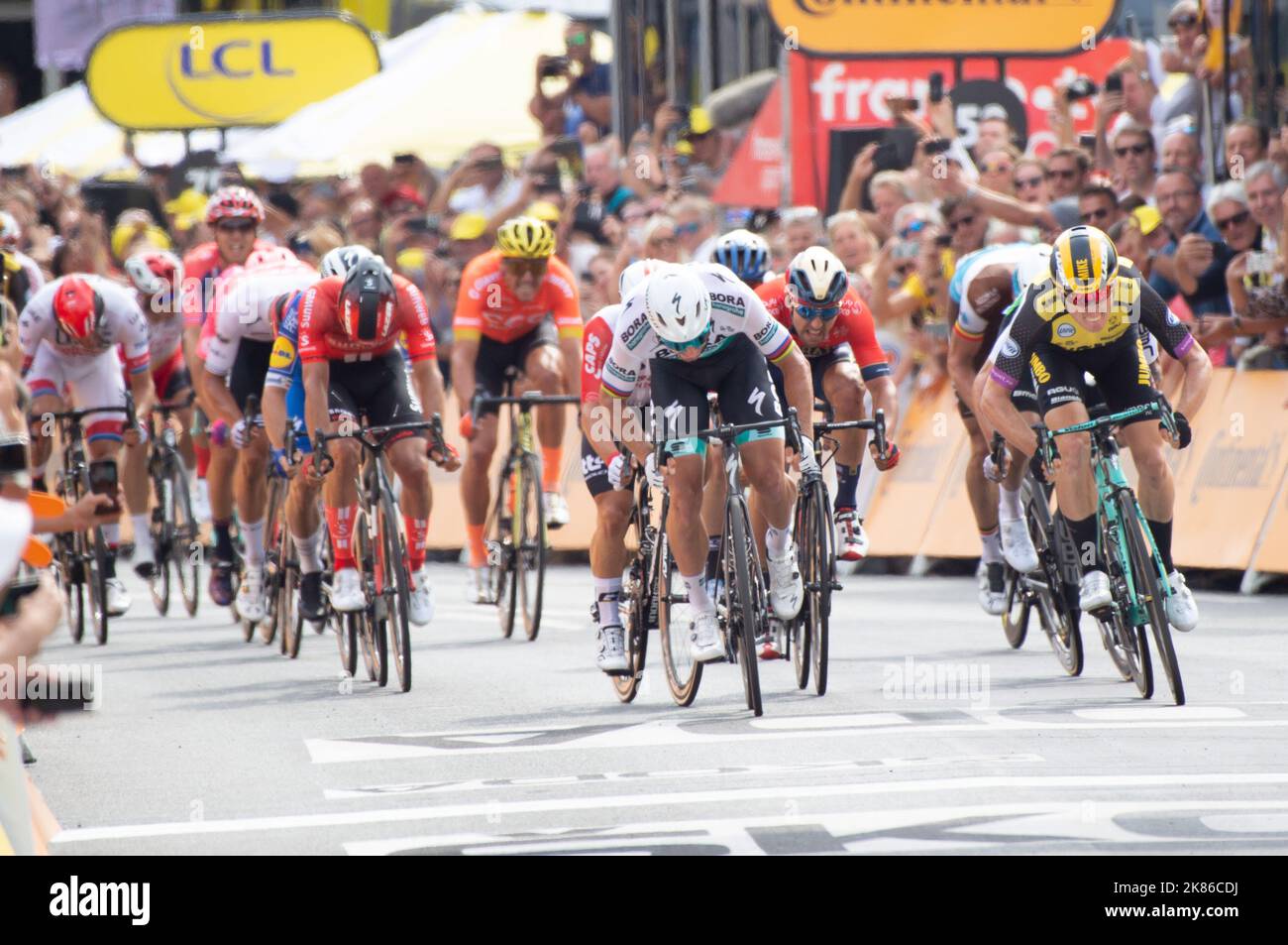 Dutch rider Mike Teunissen for team Jumbo Visna wins the start narrowly ...