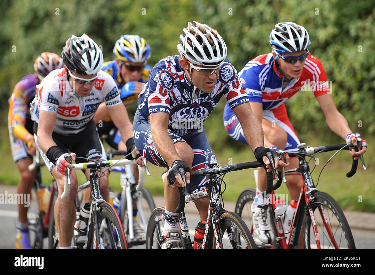 Botero Racing Team Rock Racing's Santiago Botero (centre) heads the leading pack during ...