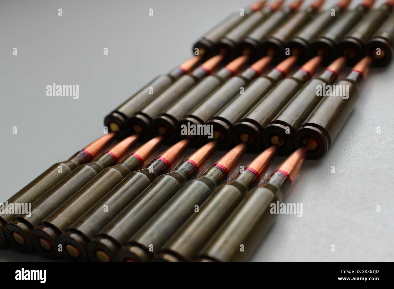 Live Ammunition For The Assault Rifle Is Laid Out In Rows Isolated
