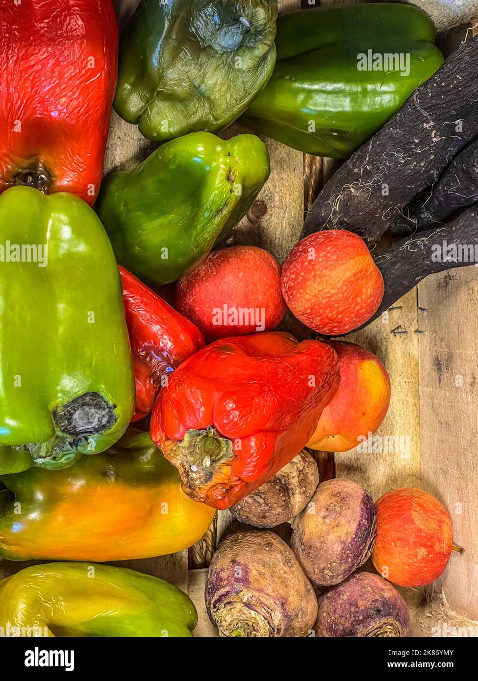 loose sale, rotten fruits and vegetables. Over the expiry date Stock Photo