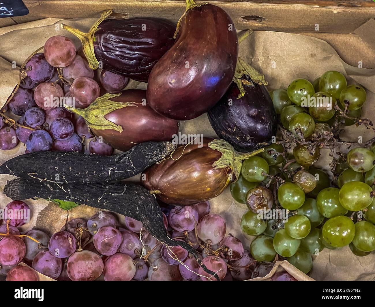 loose sale, rotten fruits and vegetables. Over the expiry date Stock Photo
