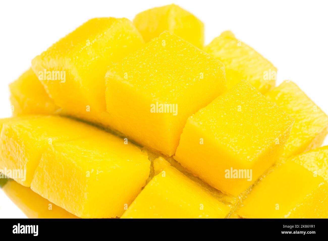 chopped half of ripe mango fruit isolated on white background Stock ...