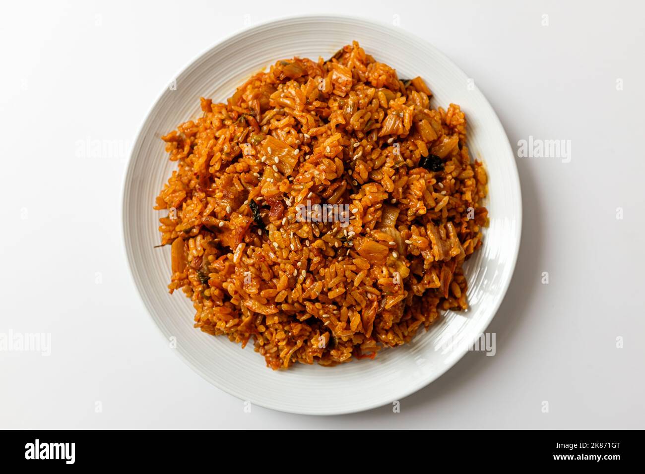 Korean fried rice. Fried rice with kimchi. Spicy rice dish Stock Photo