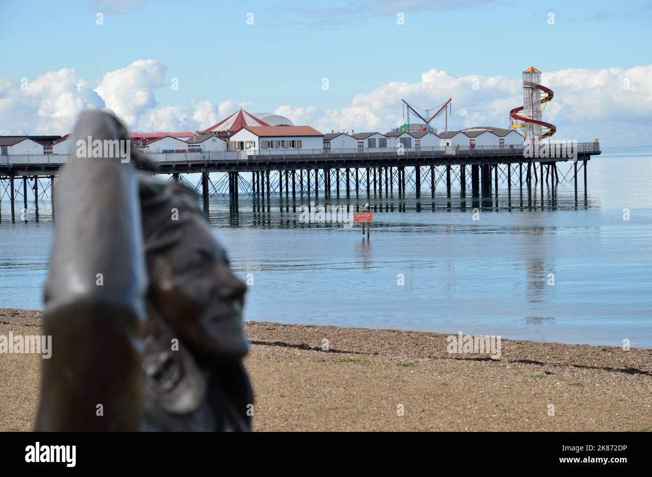A bronze statue by Stephen Melton of aviator Amy Johnson on the seafront in Herne Bay, Kent. Her plane ditched in the sea near the town in 1941. Stock Photo