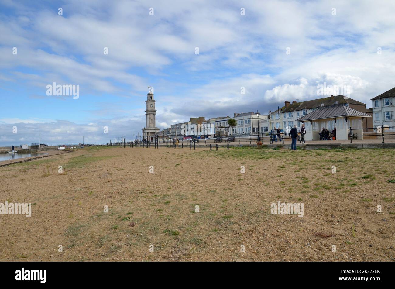 The seafront at Herne Bay in Kent with the world's first purpose built clock tower in the distance Stock Photo