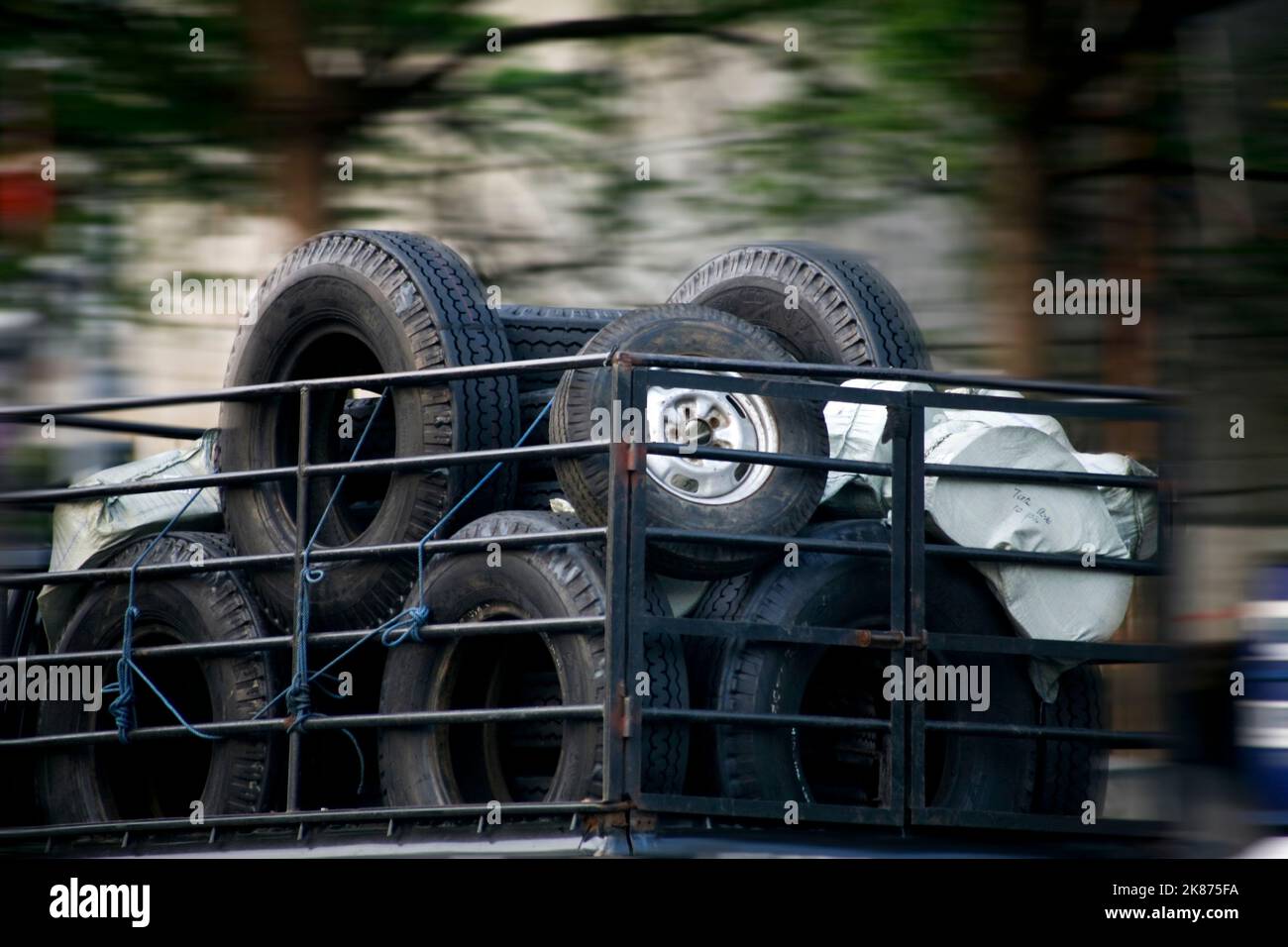Stacks of tires in truck Stock Photo
