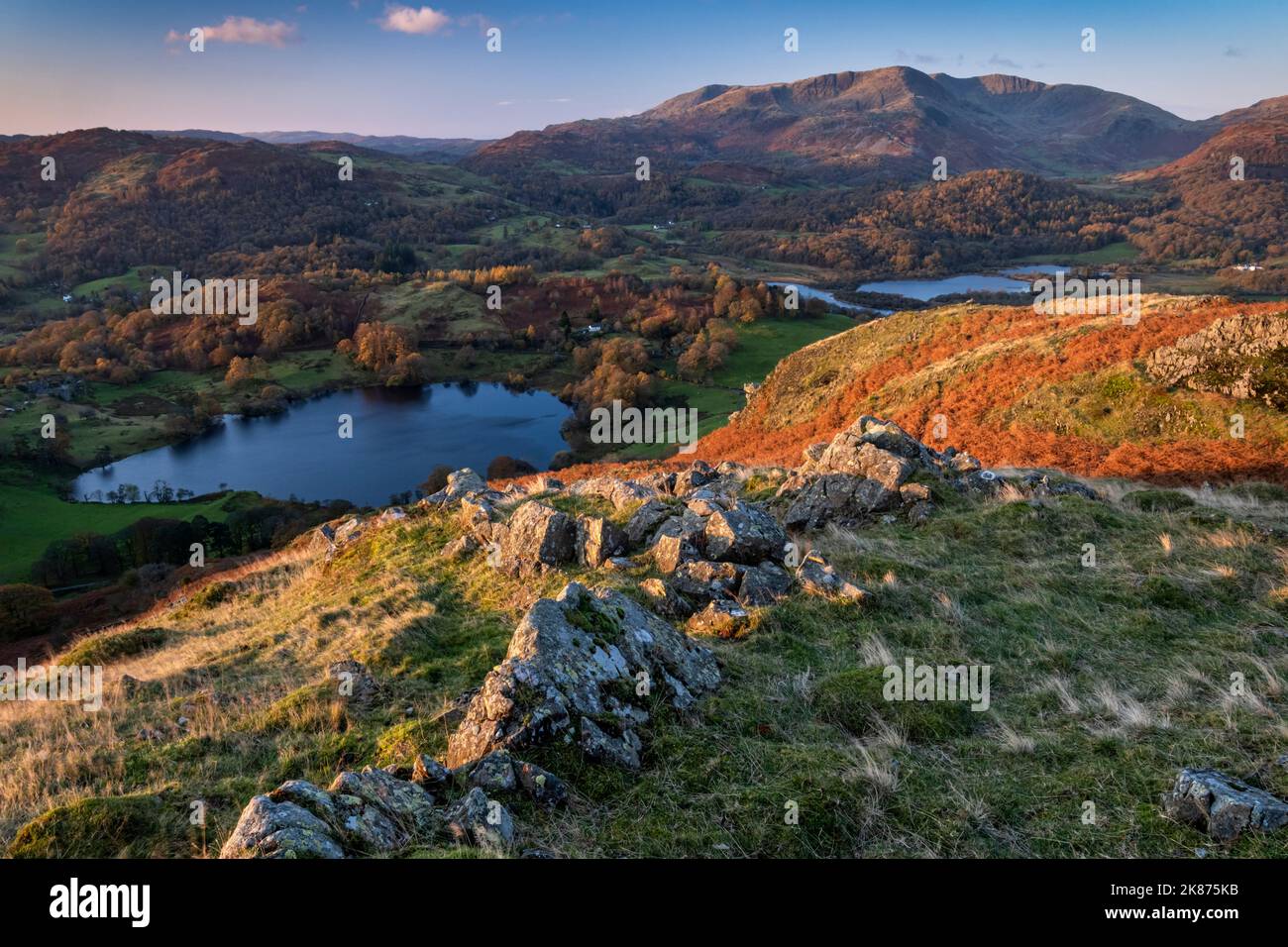 Loughrigg Tarn, Elter Water and Wetherlam from Loughrigg Fell in autumn, Lake District National Park, UNESCO, Cumbria, England Stock Photo