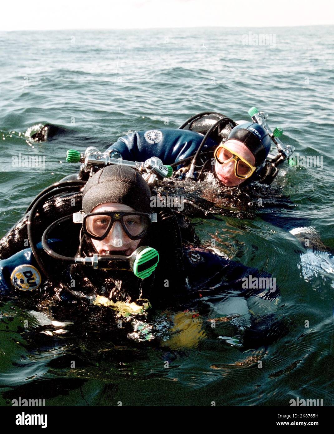 Scuba divers during an expedition, here on their way out to dive down
