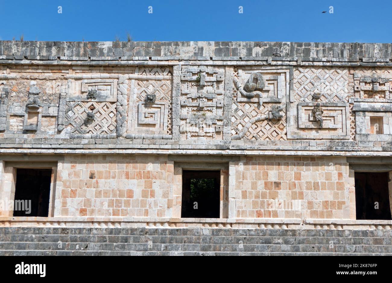 View of the Maya archeological site of Uxmal in Yucatan, Mexico. Mayan ruins with Nunnery Quadrangle as ancient building for tourists and travel Stock Photo