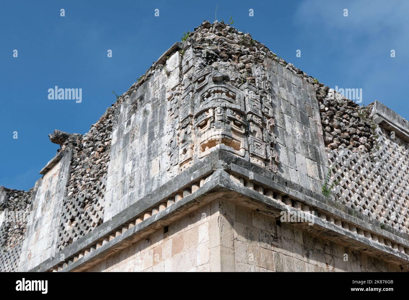 View of the Maya archeological site of Uxmal in Yucatan, Mexico. Mayan ruins with Nunnery Quadrangle as ancient building for tourism and travel. Detai Stock Photo
