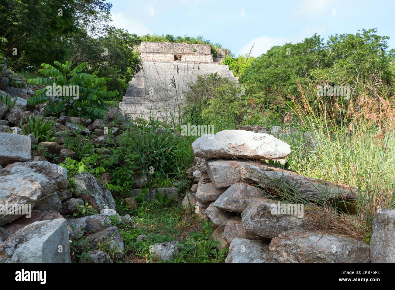 View of the Maya archeological site of Uxmal in Yucatan, Mexico. Mayan ruins with the Grand Pyramid as old building for tourism and travel Stock Photo