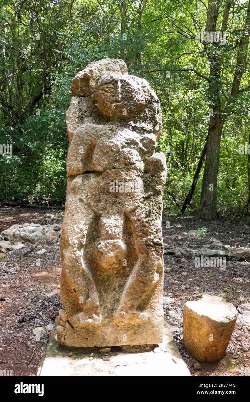 Badly damaged phallic sculpture at the Maya site of Sayil, Yucatan, Mexico along the Ruta Puuc. UNESCO World Heritage Site Stock Photo