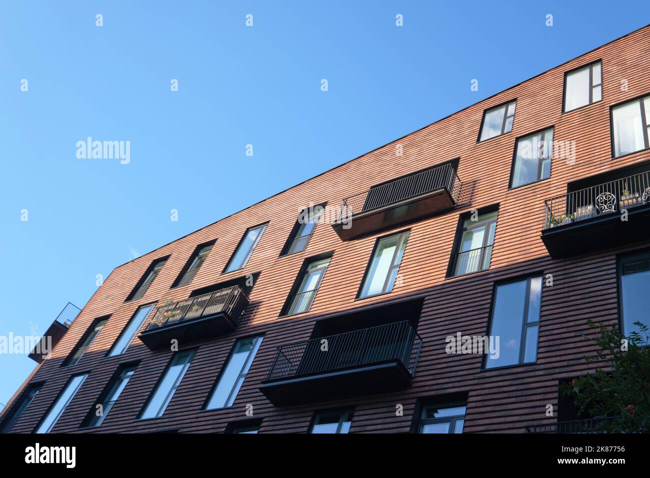 Copenhagen, Denmark - Sept 2022: Modern architecture of Kroyers Plads with brick facade designed by Cobe and Vilhelm Lauritzen Stock Photo