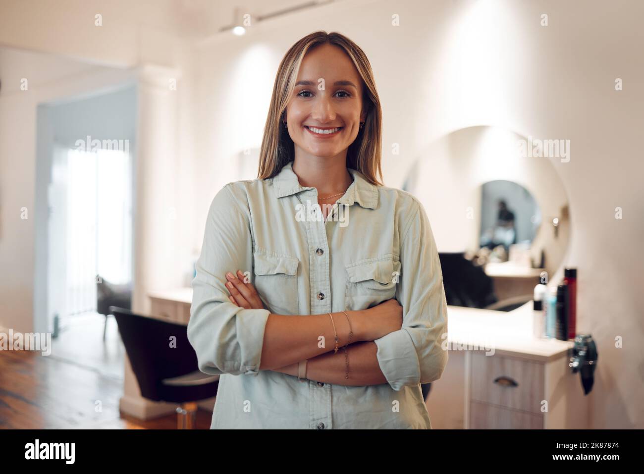 https://c8.alamy.com/comp/2K87874/salon-small-business-and-owner-with-a-woman-stylist-standing-arms-crossed-in-her-workshop-hairdresser-startup-and-entrepreneur-with-a-female-2K87874.jpg