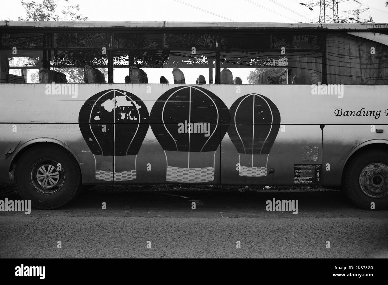 Monochrome photo, black and white photo of an abandoned bus in the Cikancung area - Indonesia Stock Photo