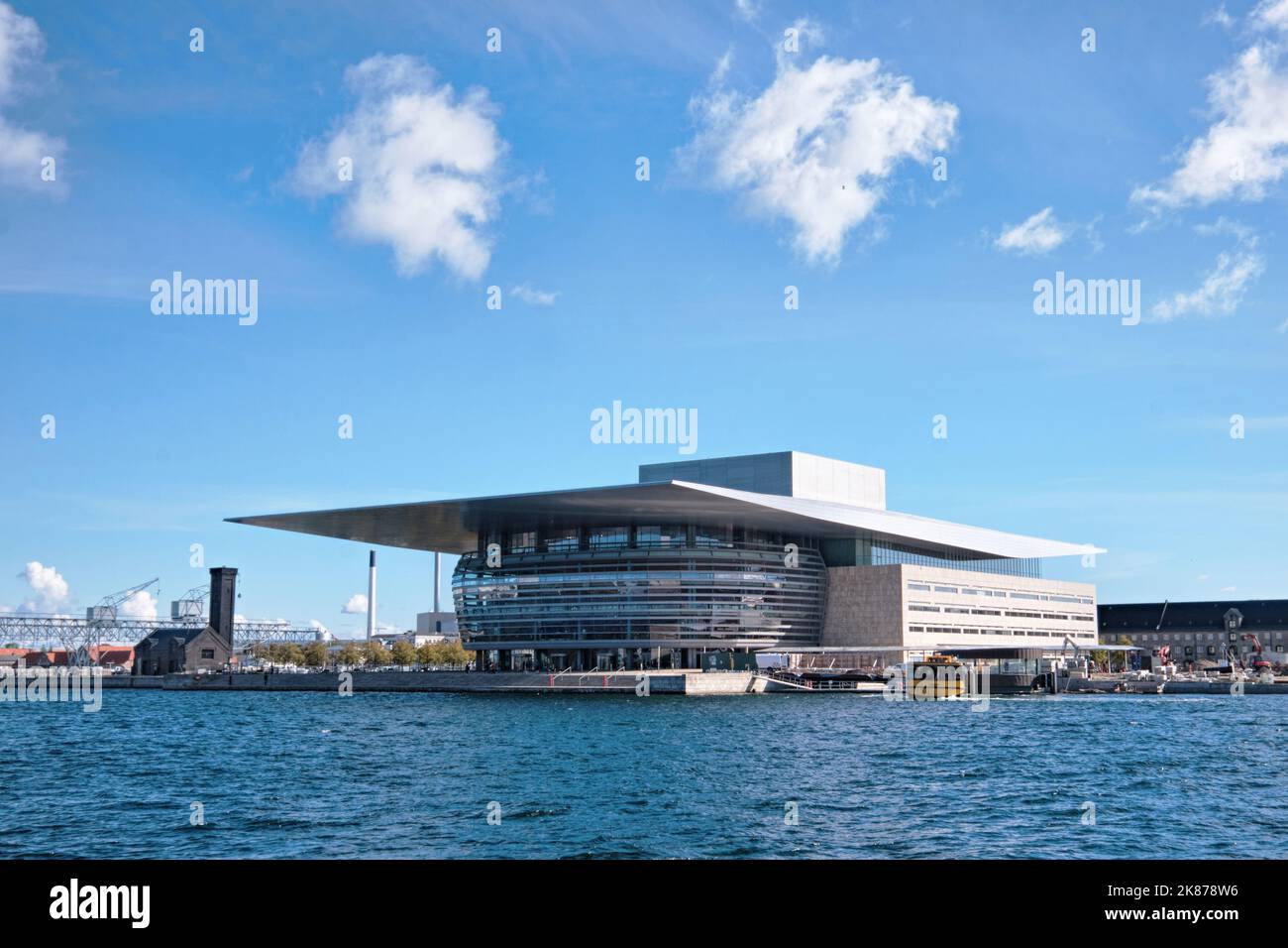 Copenhagen, Denmark - Sept 2022:  Water view of the Copenhagen Opera House (operaen), a contemporary building designed by architect Henning Larsen Stock Photo