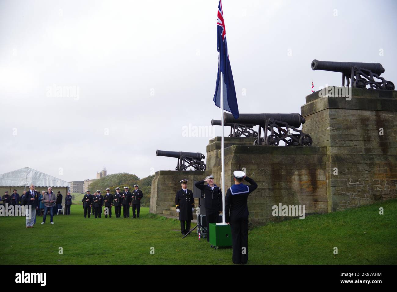 Tynemouth,UK. 21 October 2022. The blue ensign is raised during the Toast to Collingwood event at his monument in Tynemouth to celebrate the anniversary of Trafalgar. Credit: Colin Edwards/Alamy Live News. Stock Photo