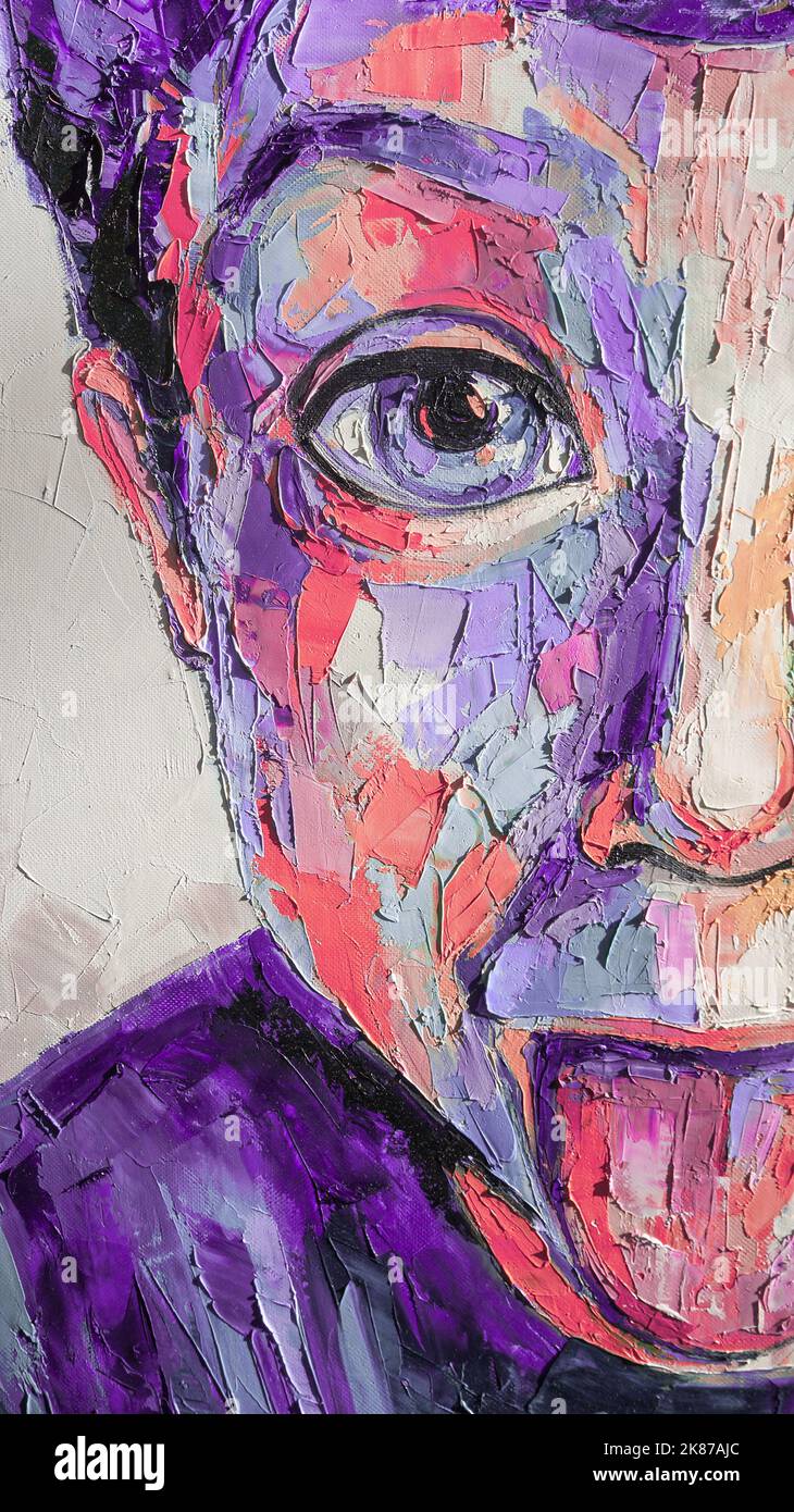 Oil portrait painting in multicolored tones. Abstract picture of a boy. Conceptual closeup of an oil painting and palette knife on canvas. Stock Photo