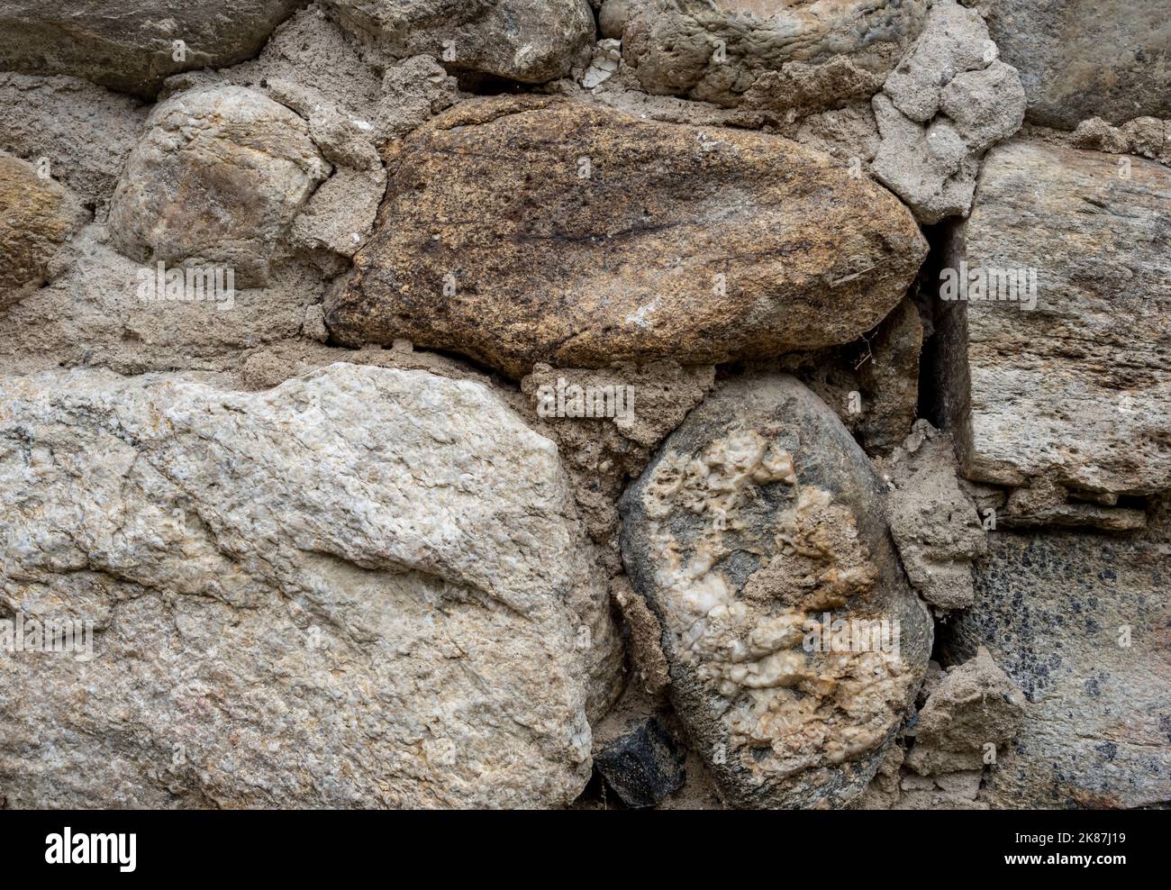 High quality old stone wall  background. Front view with copy space. Stock Photo