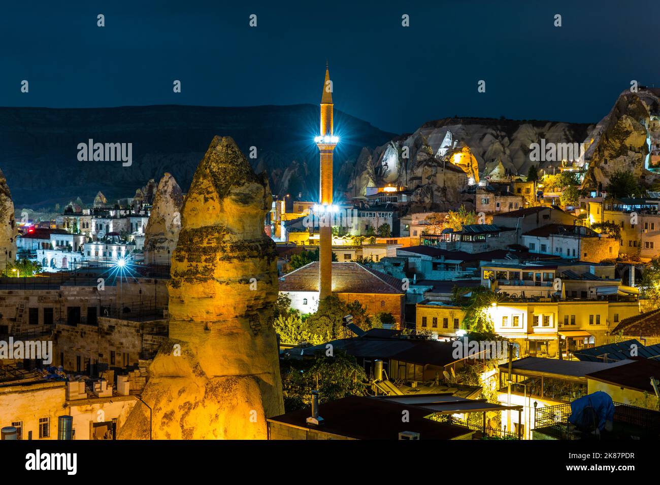 Night view of Goreme, Turkey. Goreme is known for its fairy chimneys, eroded rock formations, many of which were hollowed out in the Middle Ages to cr Stock Photo