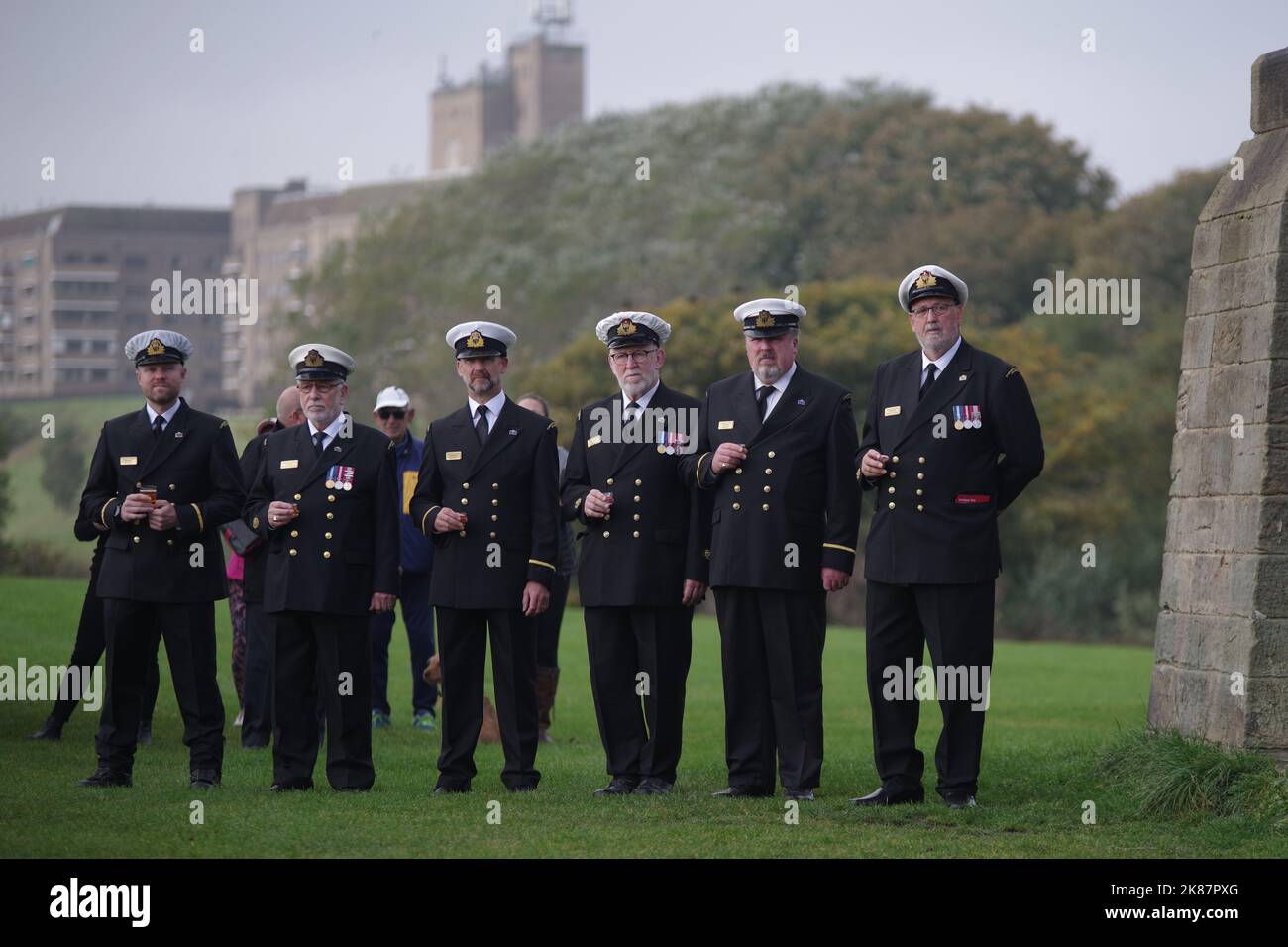 Tynemouth,UK. 21 October 2022. Members of Tynemouth Volunteer Life Brigade standing ready for the toast to Admiral Lord Collingwood at the annual Toast the Admiral event held at Collingwood's Monument. Credit Colin Edwards/Alamy Live News. Stock Photo